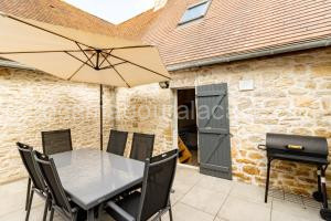 Photo de la Maisons de vacances La Boutique 2 à 4 personnes à Lacave